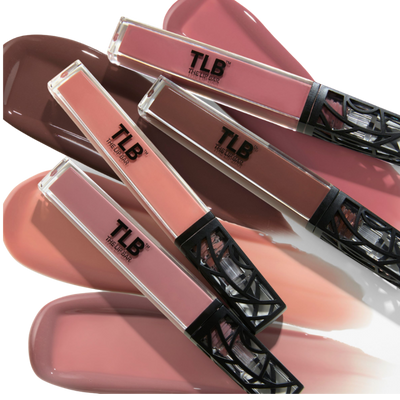 Stack of lip glosses with 'TLB' branding on a white background